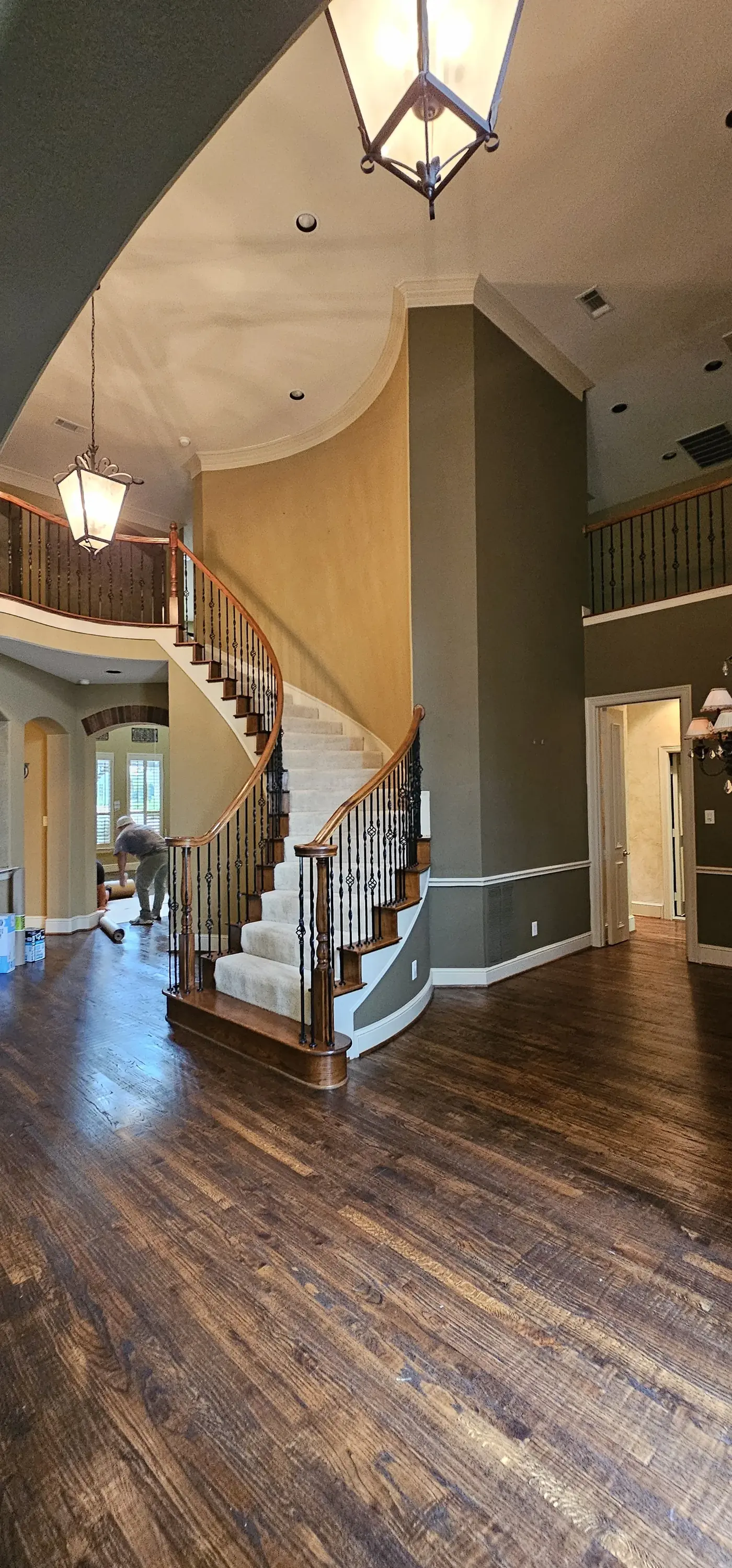 Curved staircase entry before remodel