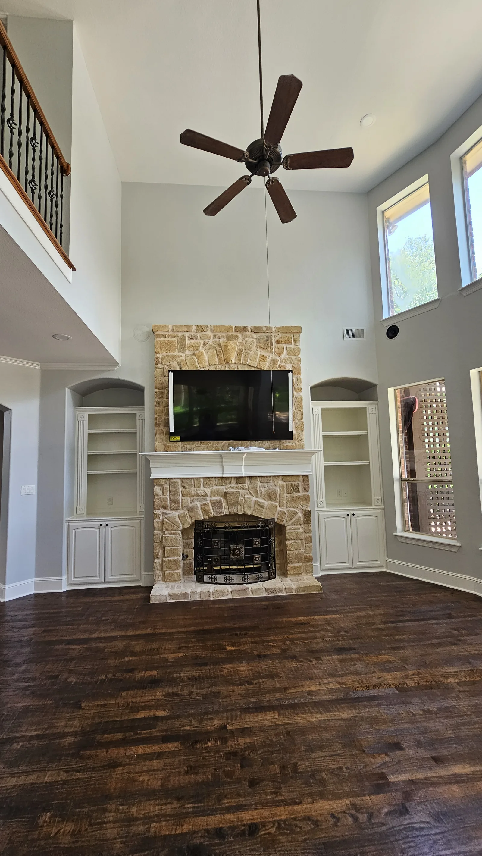 Fireplace with painted built-ins and TV