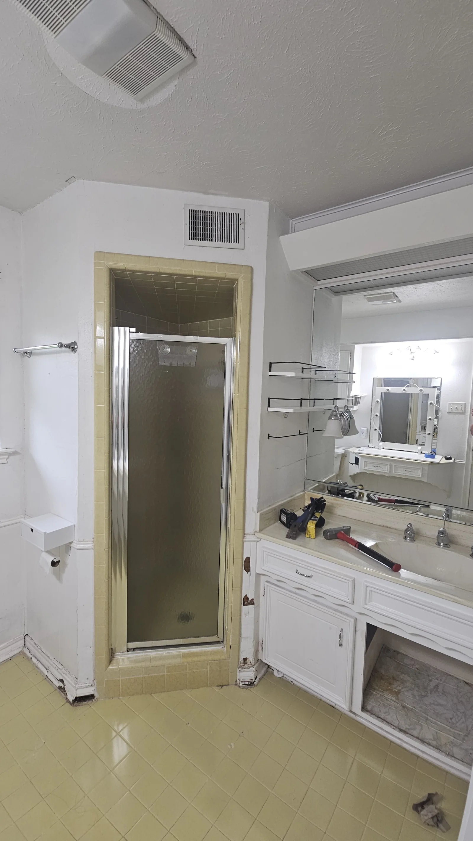 Old yellow tile bathroom before remodel